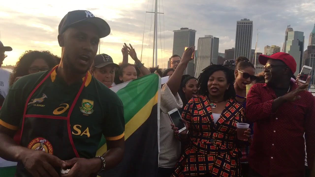 South Africans singing their national anthem in New York - event sponsored by Jimmy's Sauces