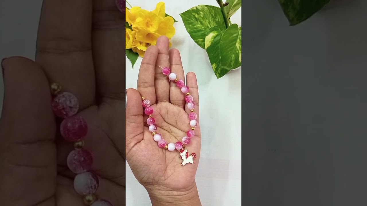 🌈Red Marble Beads with Delightful Unicorn🦄charm💖Follow on Instagram for orders.