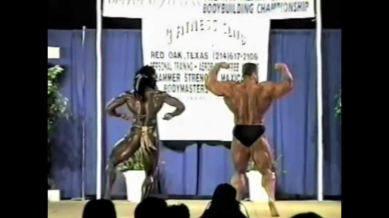 IFBB Pro Dorian Yates and IFBB Pro Lesa Lewis guest pose at the 1997 NPC Heart Of Texas
