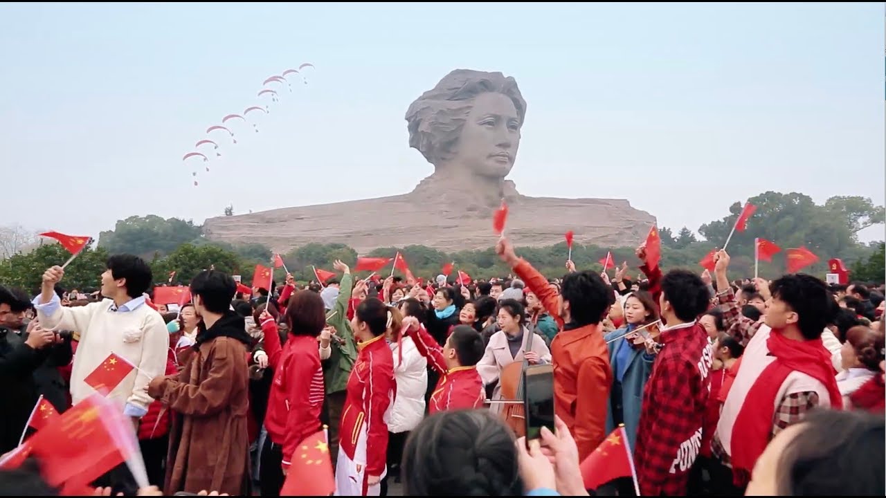 New Year flash mob: Singing from air, river and land