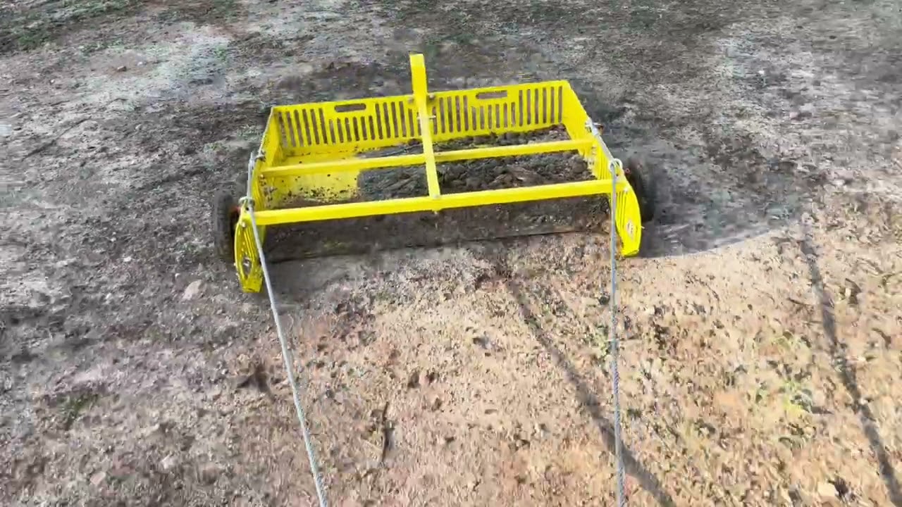 Scoop'N'Tow in Action: Carolina Demonstrates Easy Paddock Clearing with her 4-Wheeler!