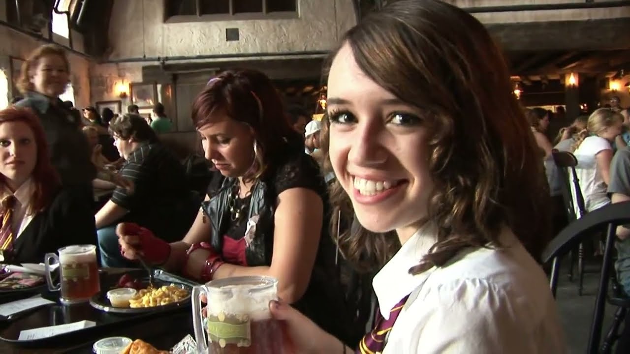 Excited fans finally get into The Wizarding World of Harry Potter - Opening Day with butterbeer