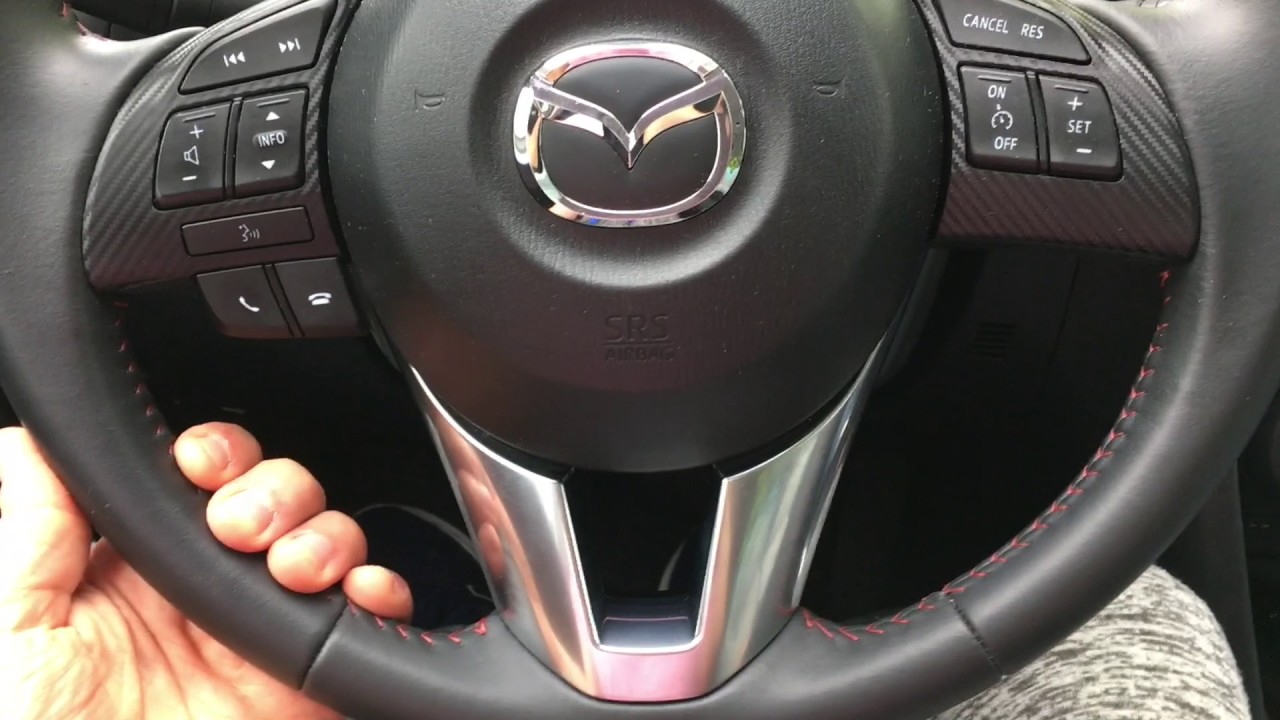 2016 Mazda mazda3 i touring overview and real MPG.