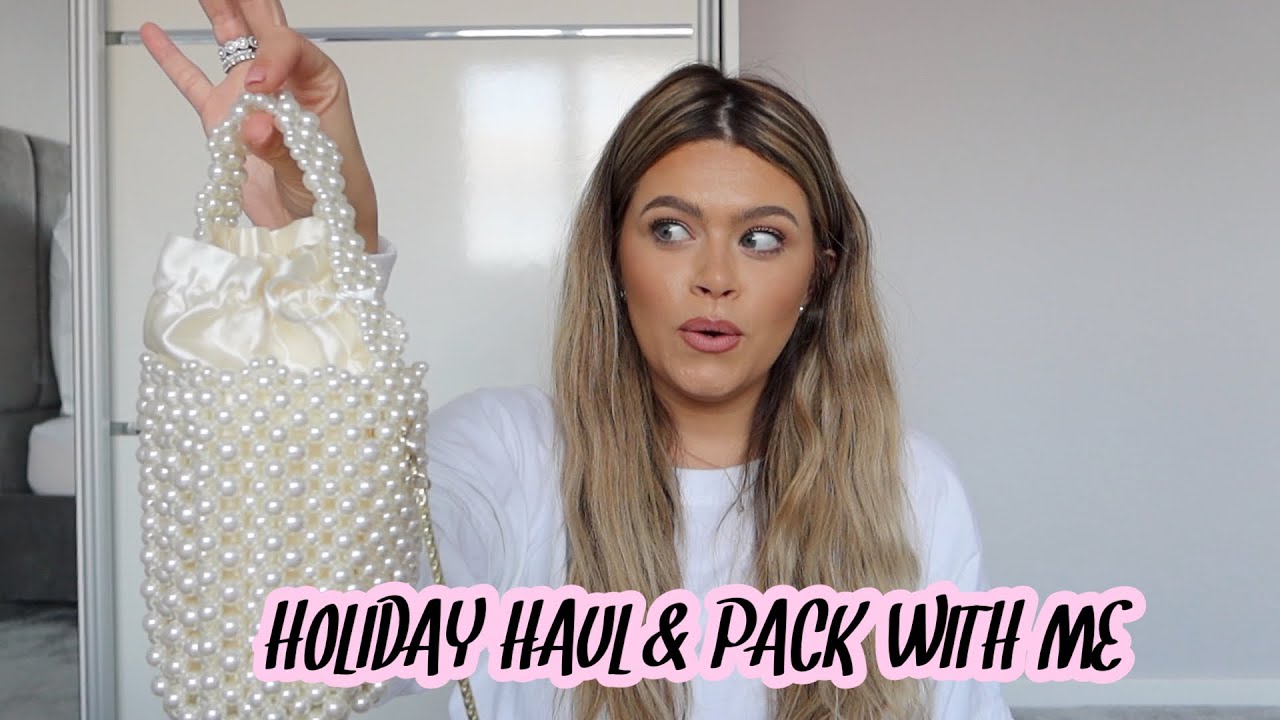 HUGE HOLIDAY HAUL & PACK WITH ME FOR SANTORINI | PAIGE