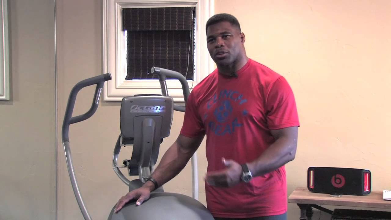 Herschel Walker On His Octane Fitness Elliptical Machine