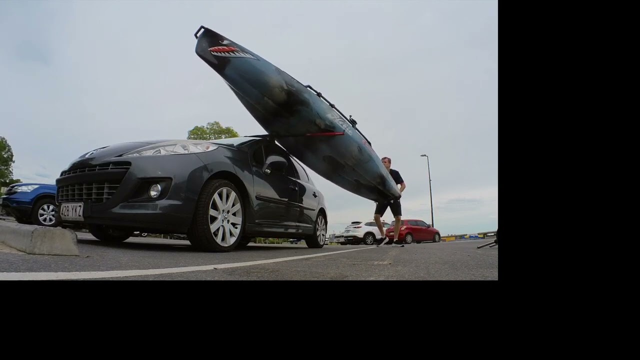 Loading a Pro Angler 14 on top of a car
