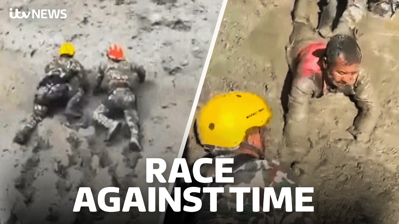 Watch as Nepalese army crawl through mud to rescue trapped workers after flash floods