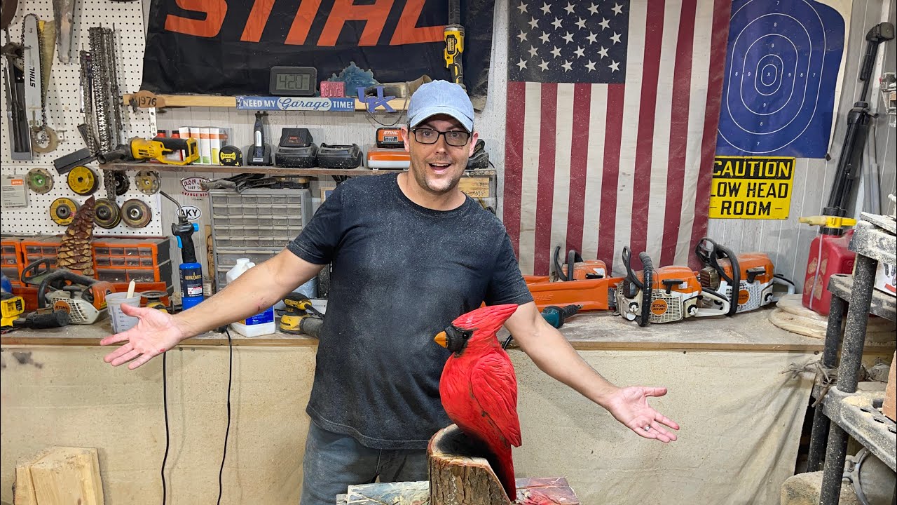 Trav Carves a Cardinal-Chainsaw Carving