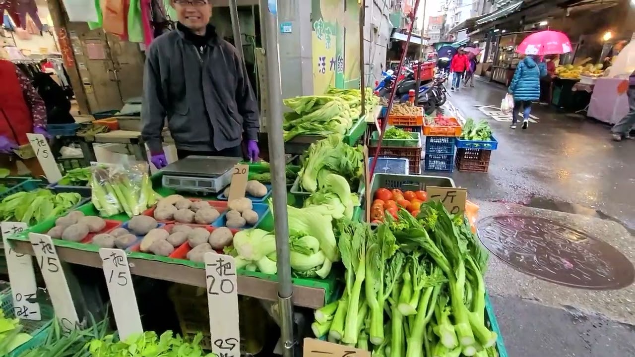 Walking in the streets and food market of Zhonghe District, New Taipei City, Taiwan after the rain