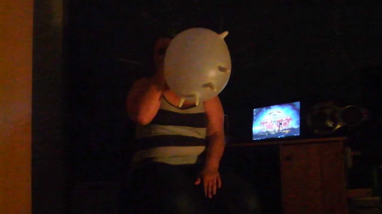 Girl Blows on Medical gloves