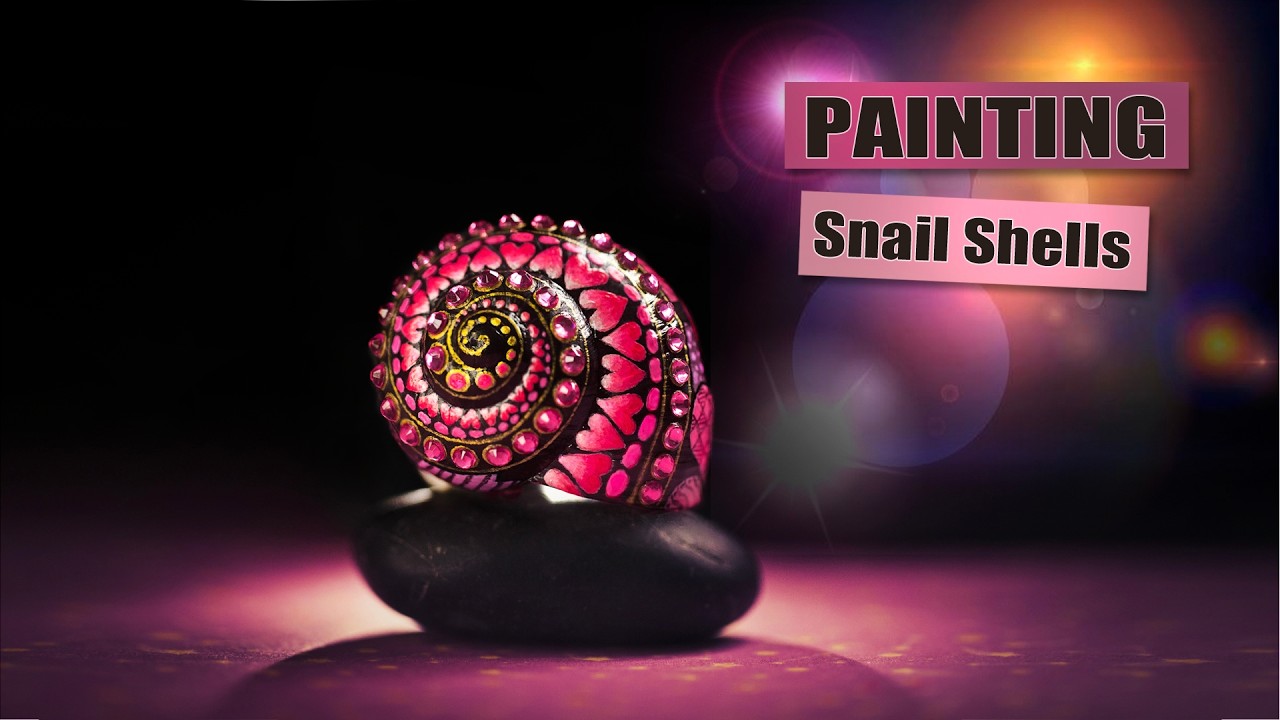 Painting a snail shell with pink hearts 🎔