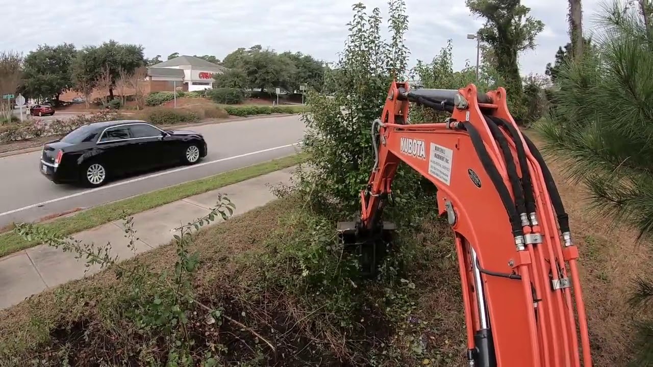 Clearing Brush Off A Roadside Embankment With The Kubota U55