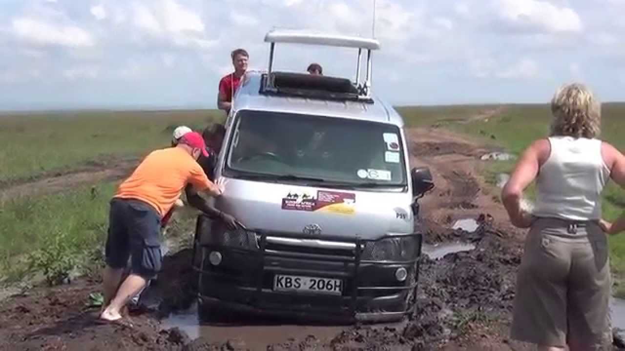 Car stuck in puddle in Masai Mara
