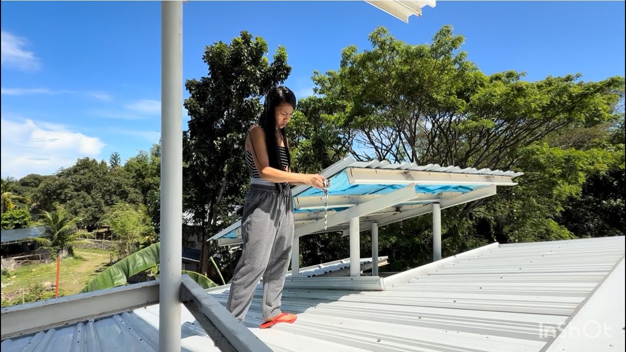 Wild Filipina! Climbs out on third story roof of a island castle 😎🌴🌴￼￼