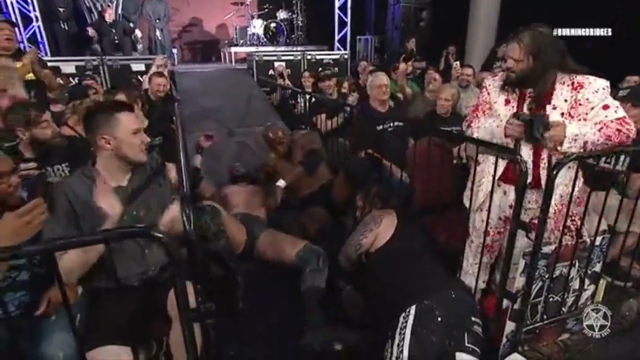 Demarcus Kane Dives over Stockade and Matthew Justice