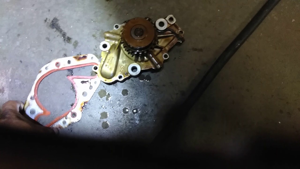 Ubicacion de bomba del agua Chrysler 300 2.7