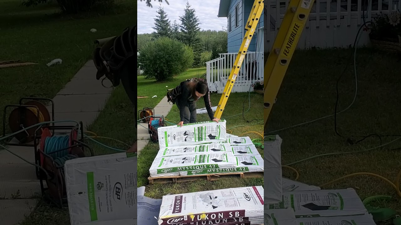 slowly making a roofer out of her, she eventually got that bundle up the ladder