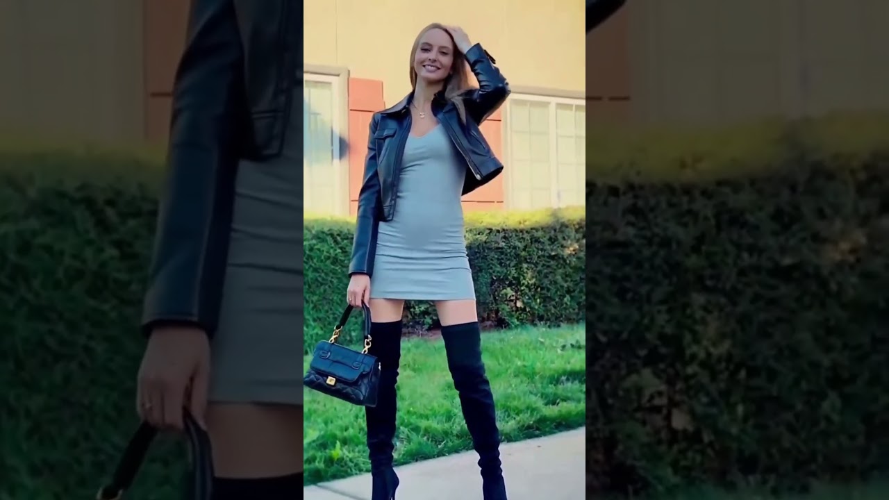 Women in thigh high leather boots and jacket