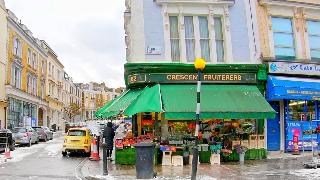 Walking through Belsize Village, North West London on a Snowy Day