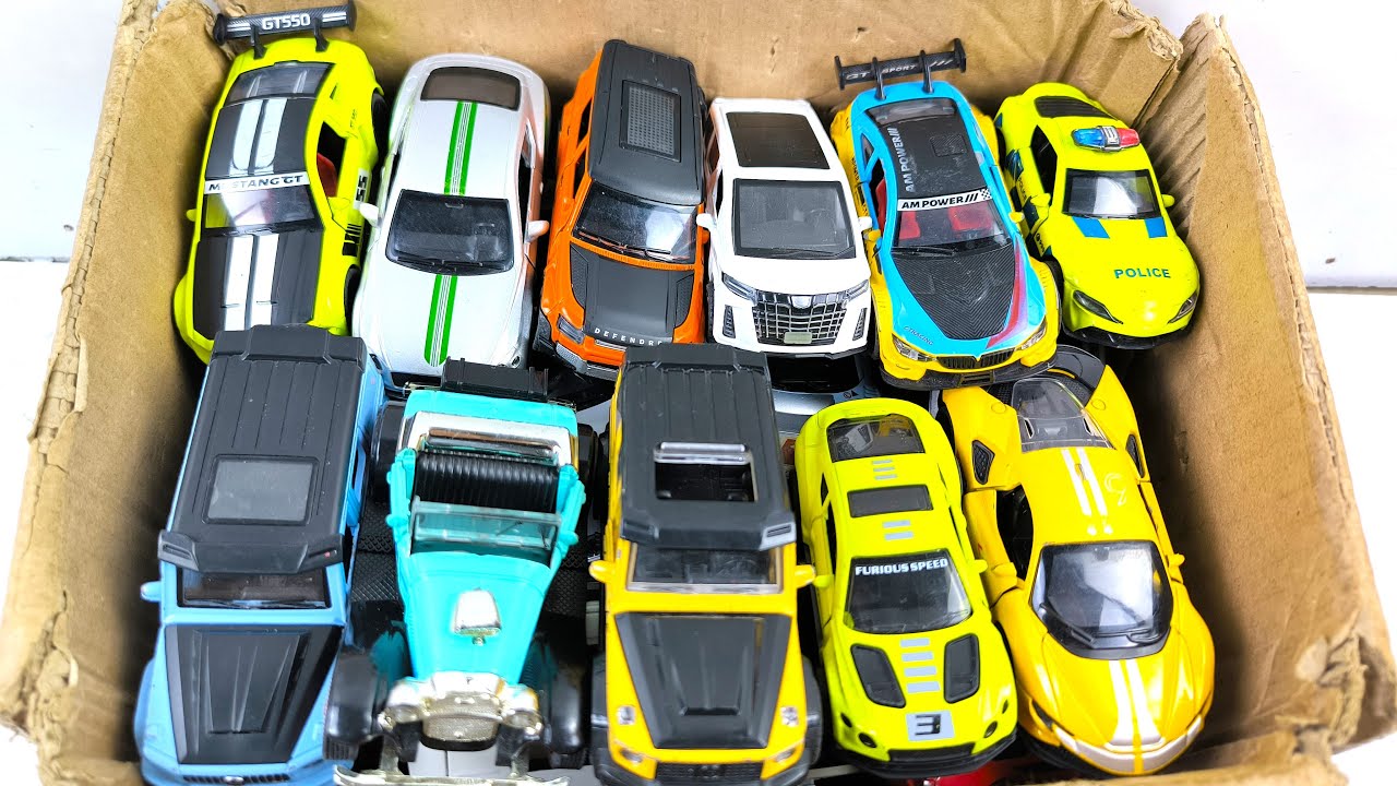Box Full of Model Cars -Mazda Mx5, Koenigesgg Jesko, Lamborghini Scv12, Byd Yang Wang U8, Toyota Car