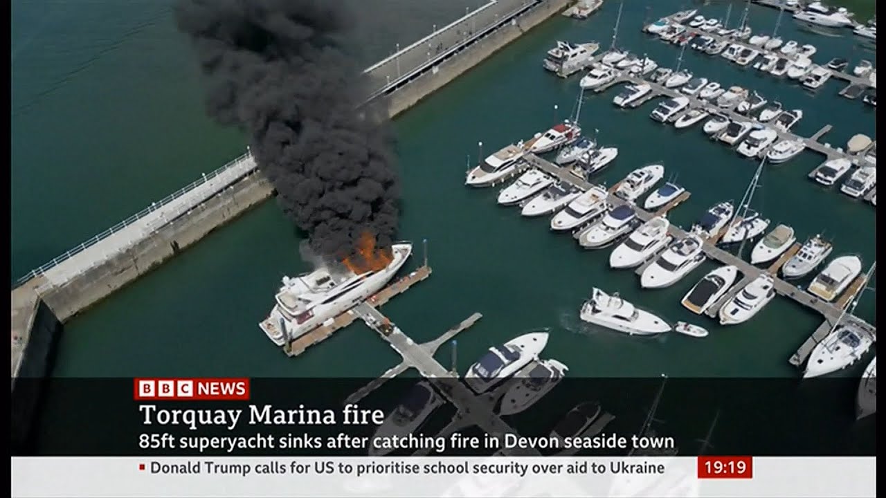 Superyacht sinks in Torquay harbour after a large fire (1) (UK) - ITV & BBC News - 28th May 2022