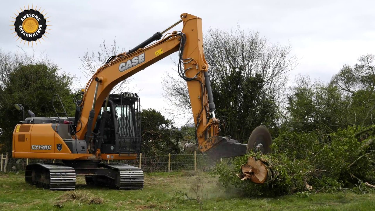 Case CX130C  excavator cutting down trees with a circular saw