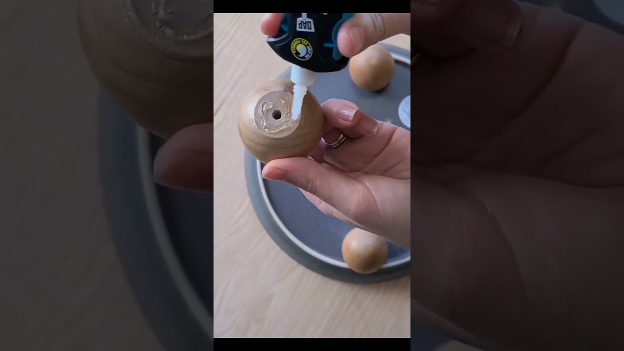 Grab a plate and wooden knobs to make an easy tray! 