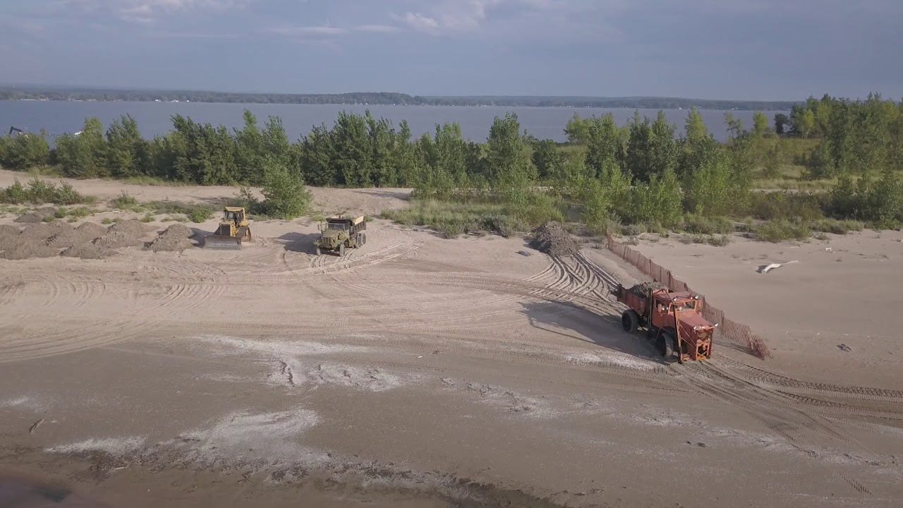 Dredging the channel from Sandy Pond to Lake Ontario