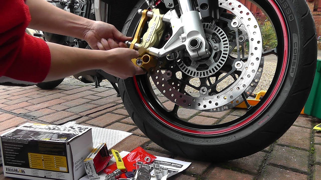 Установка дискового замка Roadlok на мой Aprilia Tuono V4R APRC.