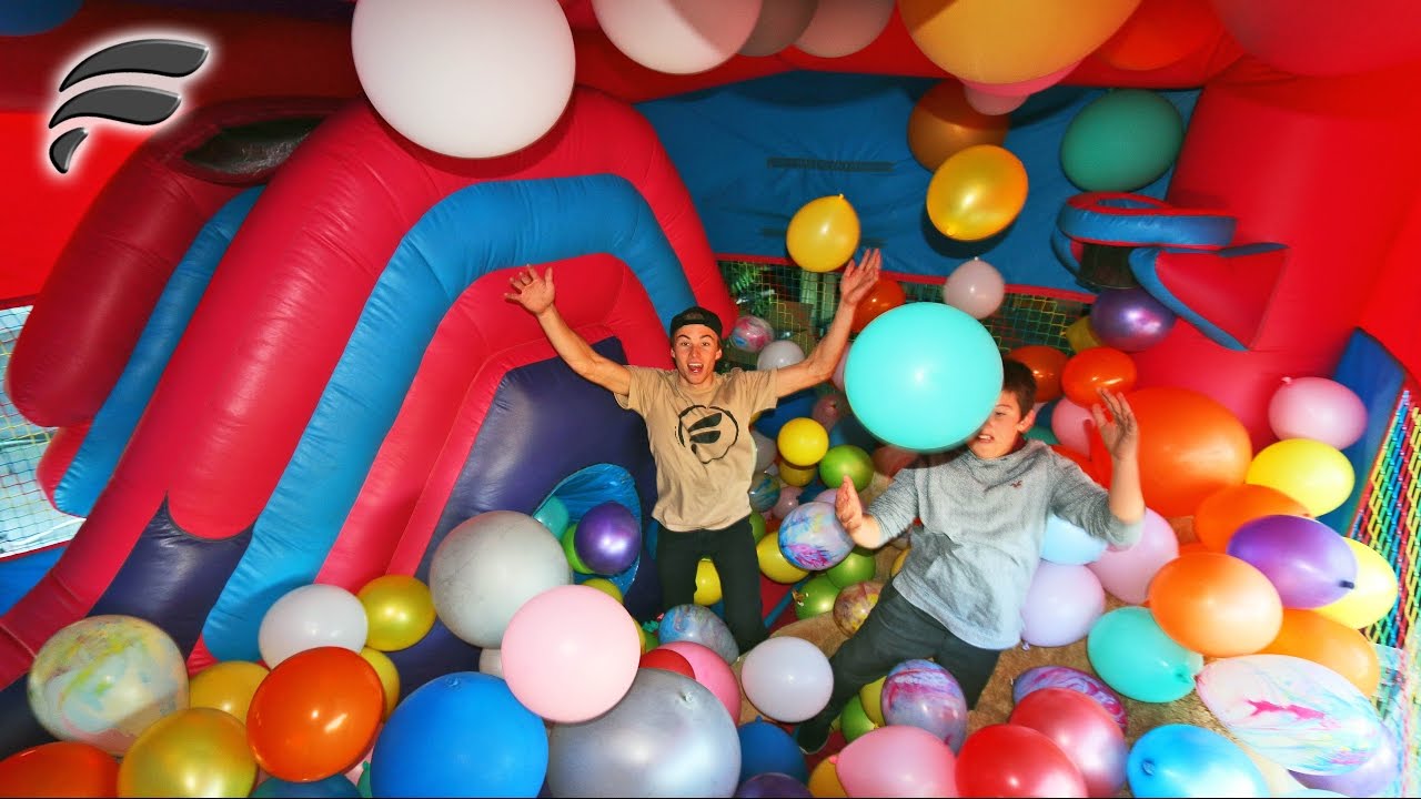 BOUNCE HOUSE SLIDE FILLED WITH 500 BALLOONS!