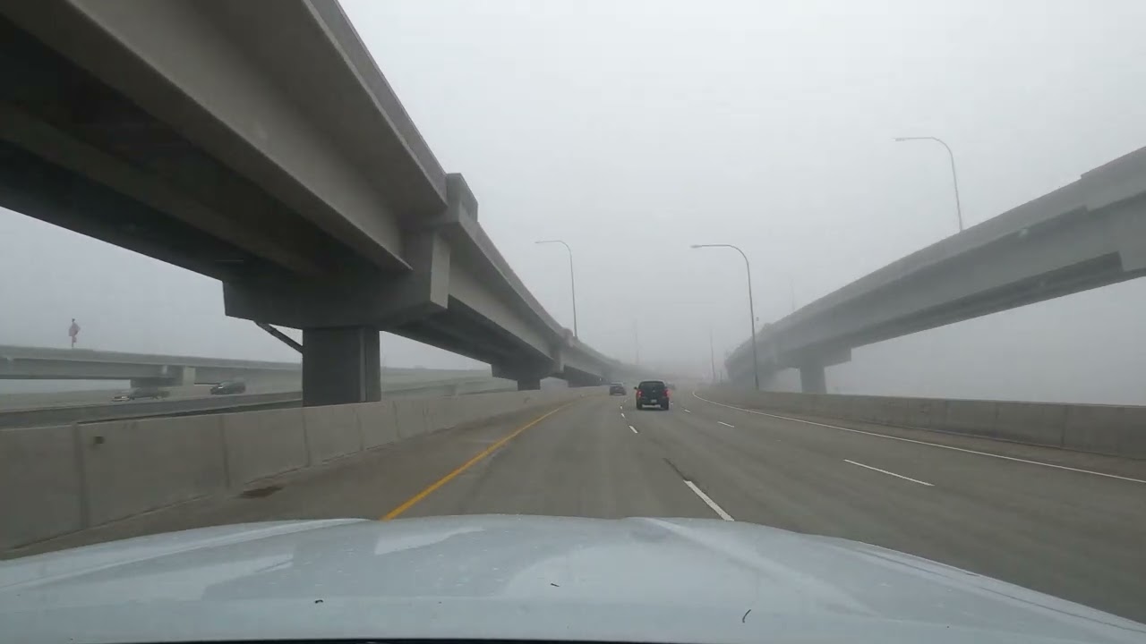 Driving in Heavy Fog Across the Tacoma Narrows Bridge to Tacoma, Washington