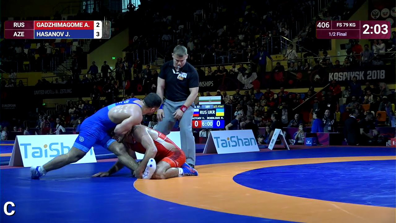 1/2 FS - 79 kg: A. GADZHIMAGOME (RUS) v. J. HASANOV (AZE)