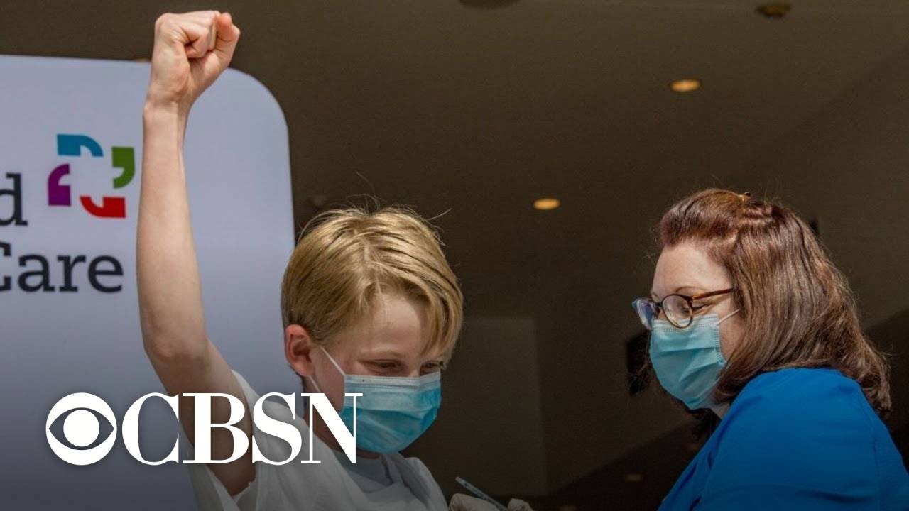 Thousands of U.S. kids line up for COVID shots as the CDC updates mask guidance