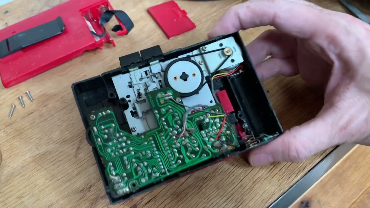 Vintage Sanyo MGP9 Personal Stereo Cassette Player Repair. Corroded Battery Terminals.