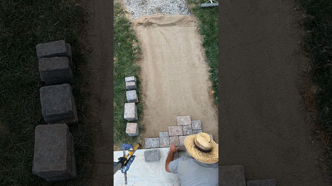 Pavers being laid.