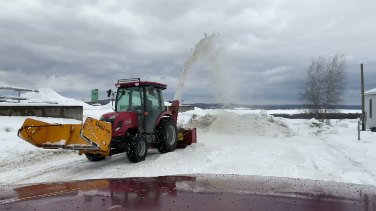 Tym 574 blowing heavy snow
