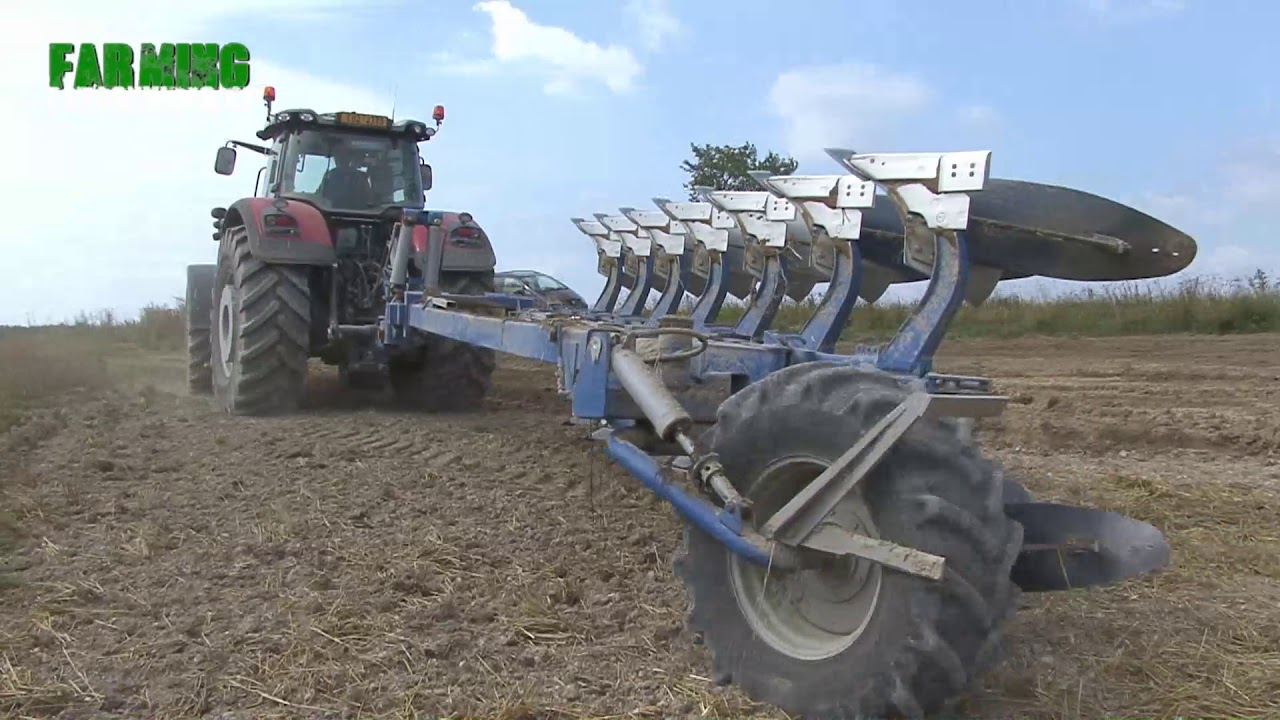Farming - Massey Furgeson 8737, Plough Överum. Autumn plowing of agricultural land.