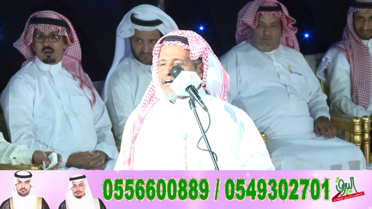 طاروق بين الشاعرين عطية الله الحرازي وحامد القارحي في حفل زواج ابناء الشريف فيصل الحرازي صالح وماجد