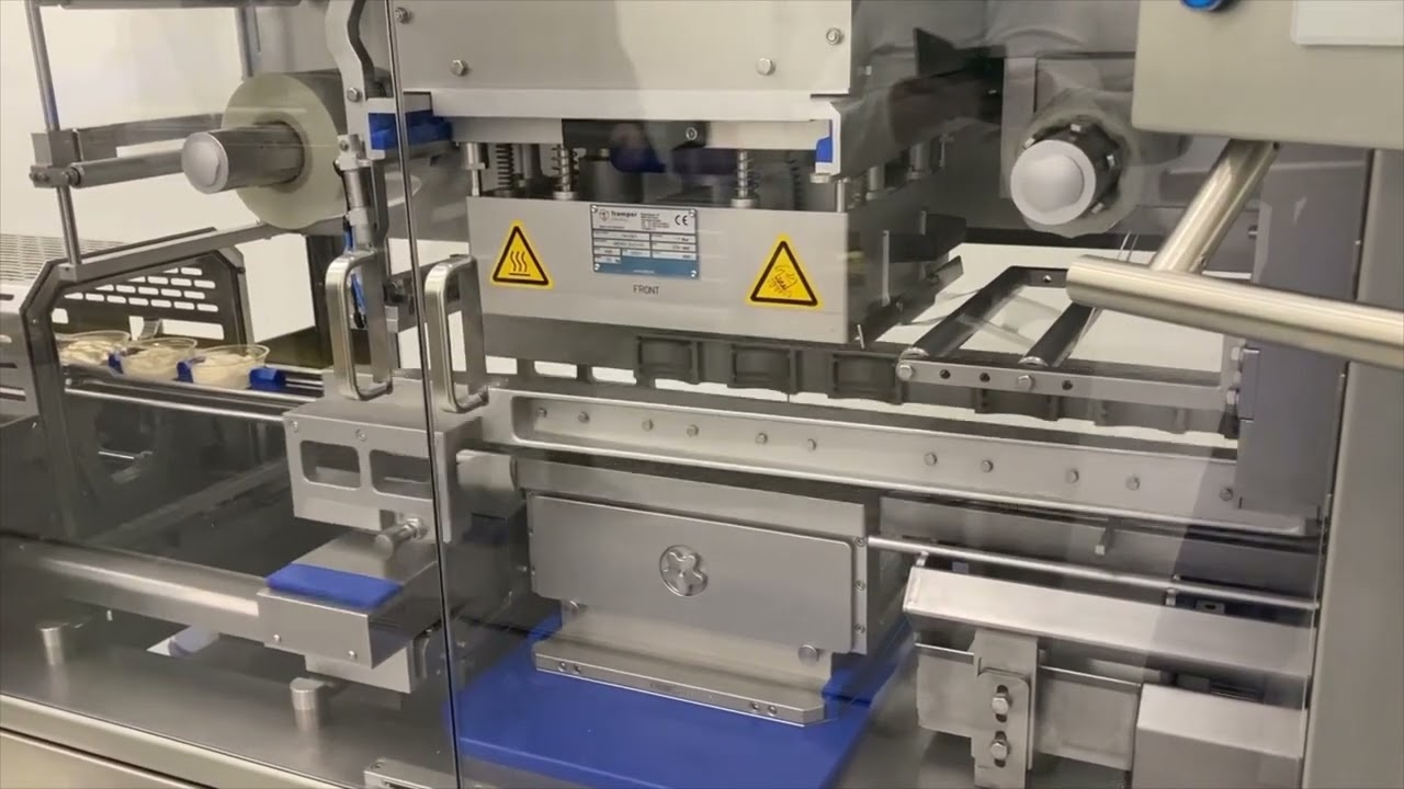 Food Automation presents Tramper Technology/Leonhardt denesting, filling sealing lidding wet salads