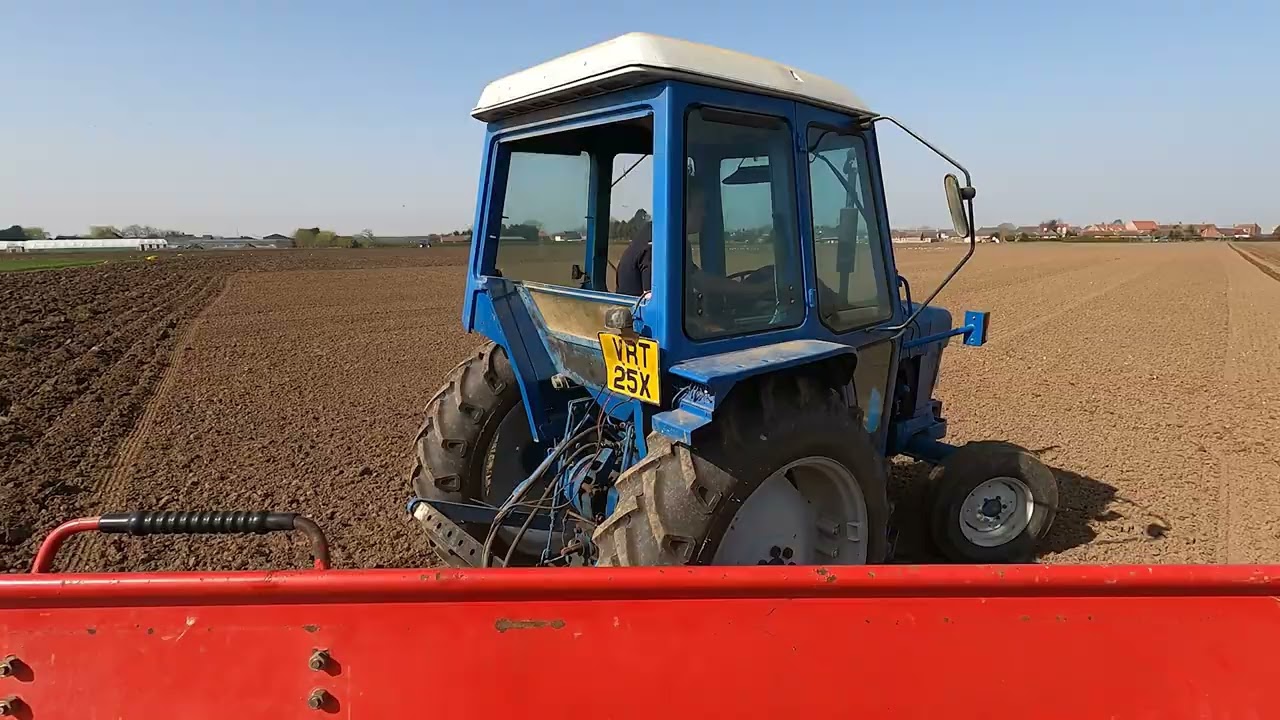 Ford 4610  and Massey 30 drill working hard - Spring 2022