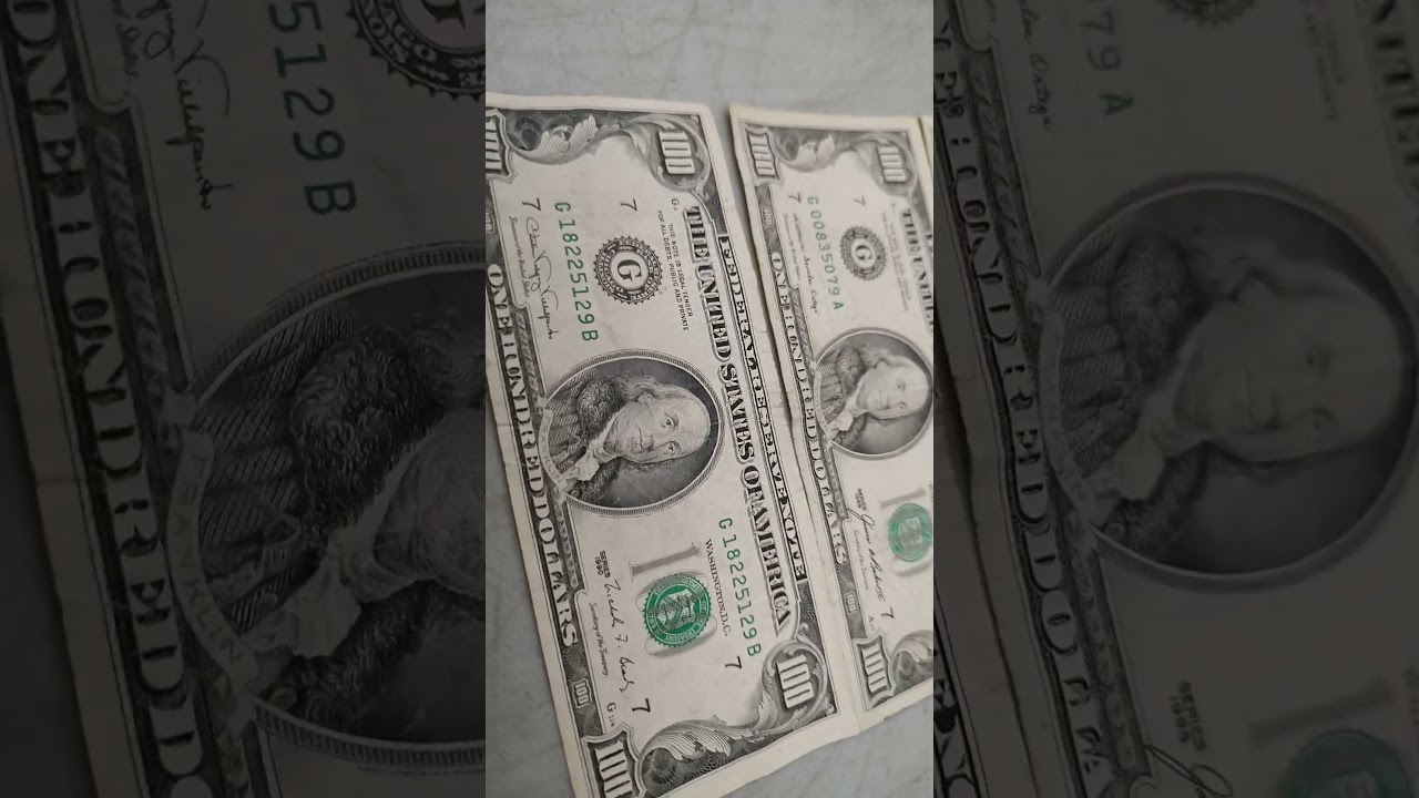Several Old style 100 Dollar Bills