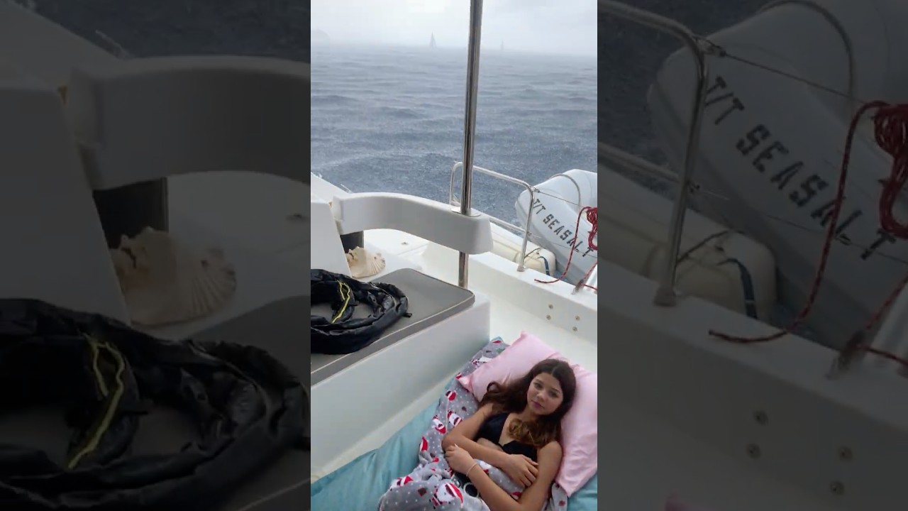 Girls enjoying the rain while sailing the catamaran? #Sailing #Catamaran #Rain #LifeAtSea #Girls