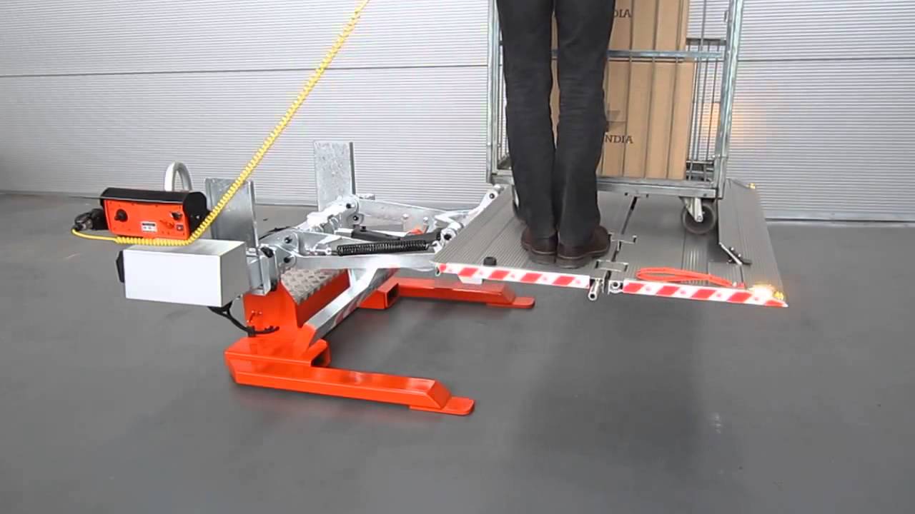 PLATAFORMA ELEVADORA PARA CARGUE Y DESCARGUE EN CAMIONES
