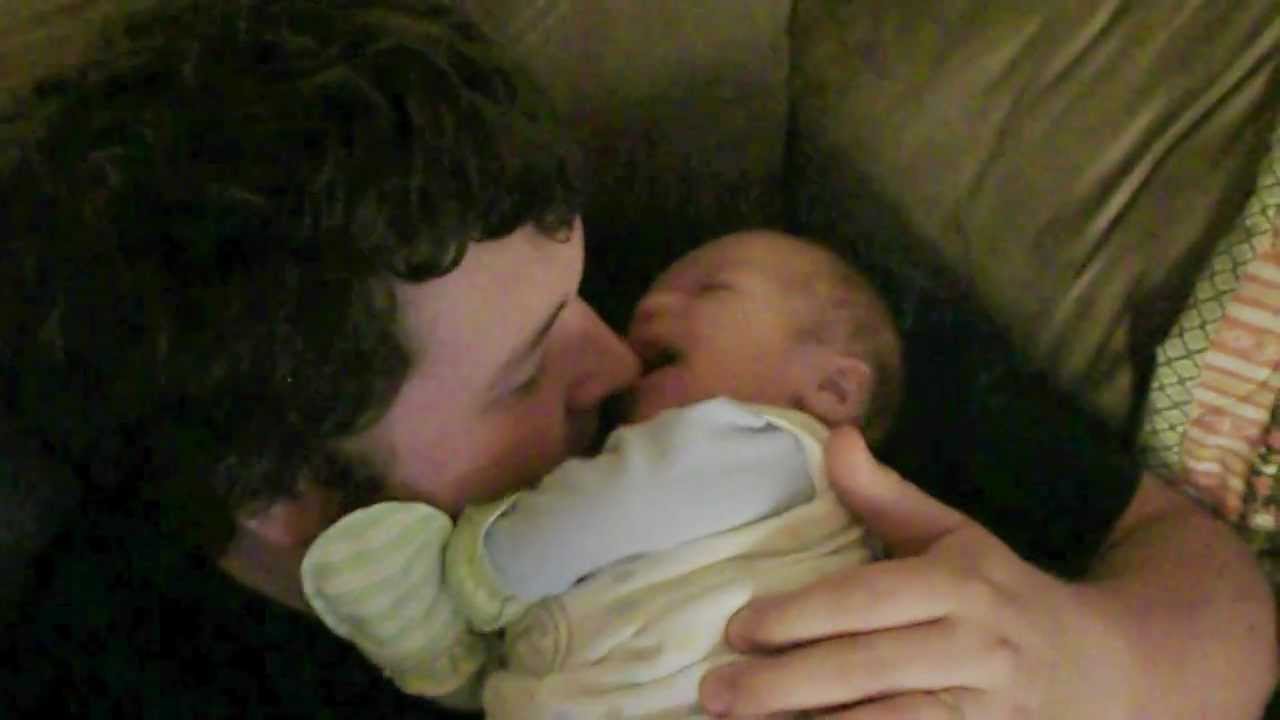 Baby Cy Sucking on Dad's Nose