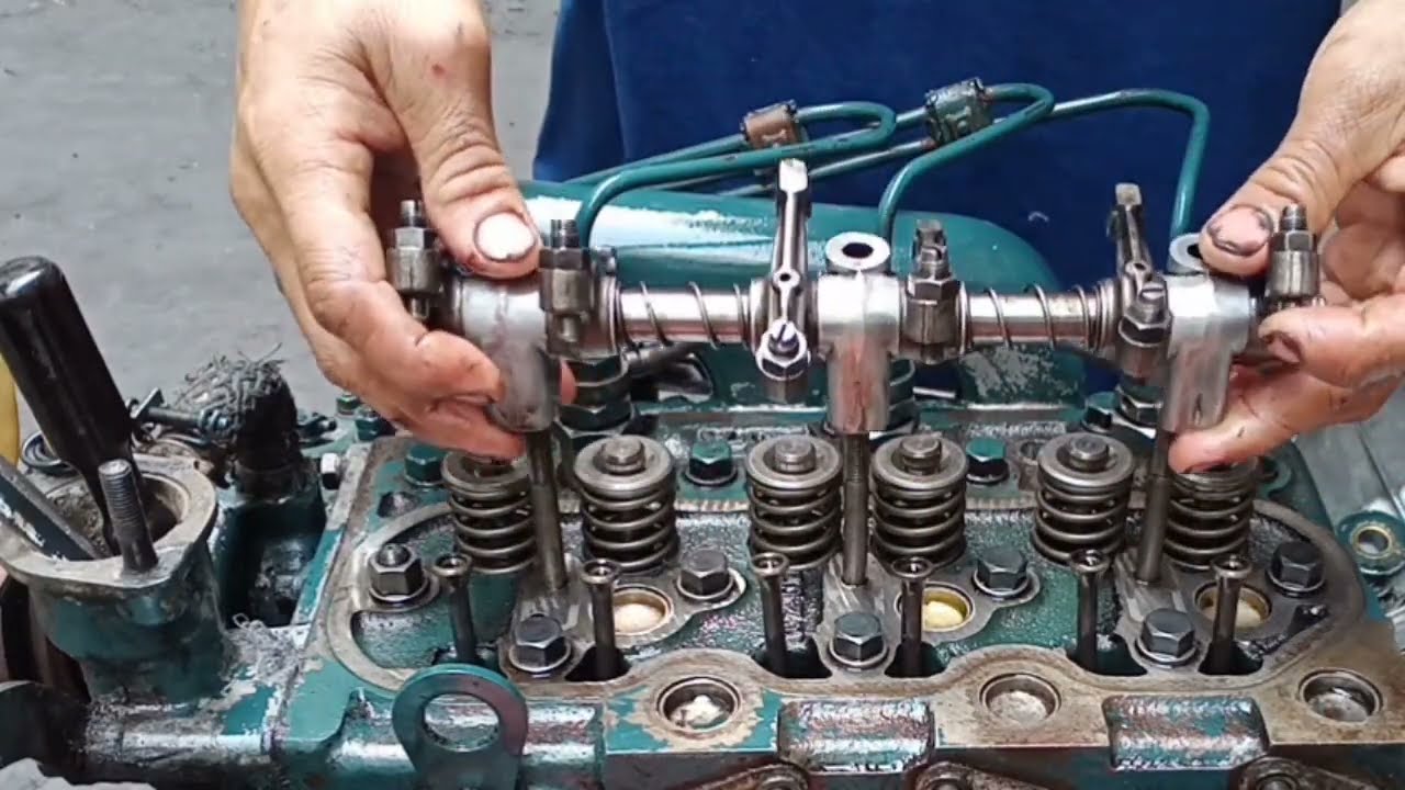 Remove and replace valve seal ,pumping oil,tune up Kubota DH1101
