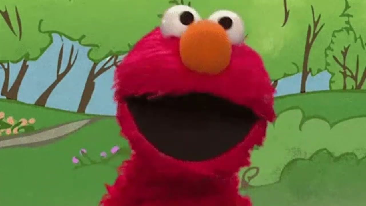 ELMO IS HAPPY WITH HIMSELF