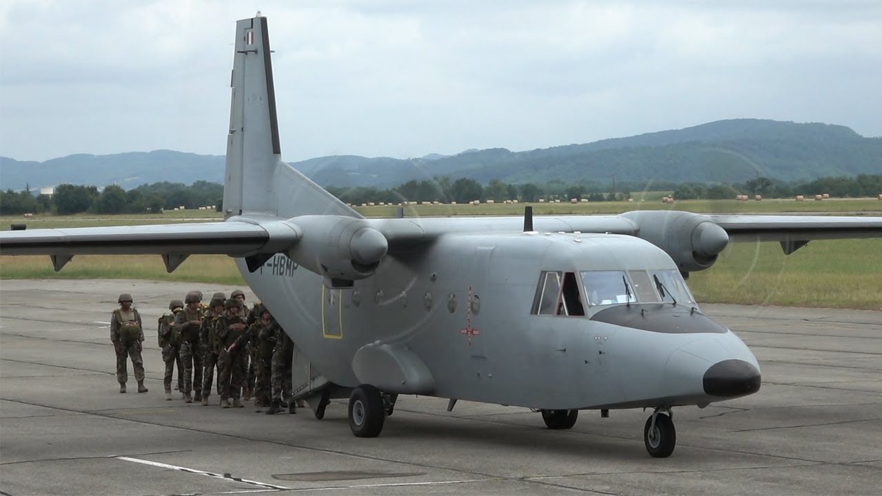Military Casa C-212 plane landing & takeoff action with paratroops | #airplane