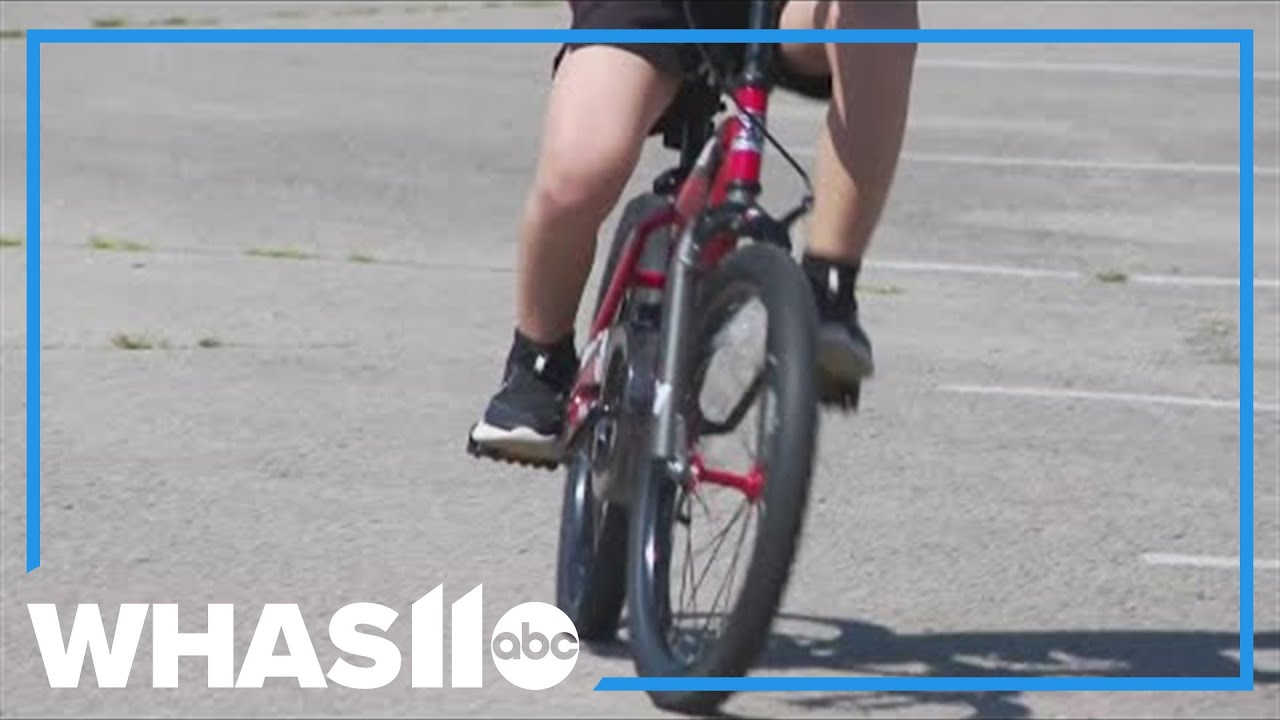 Bellarmine University camp helps children with disabilities learn to ride bikes