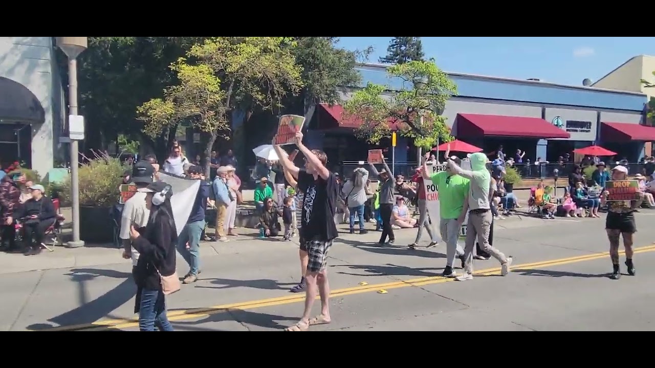 Animal rights activists protest during Luther Burbank Rose Parade in Santa Rosa