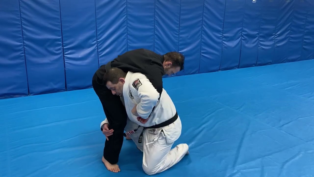 Modified Fireman’s Carry Takedown using the GI